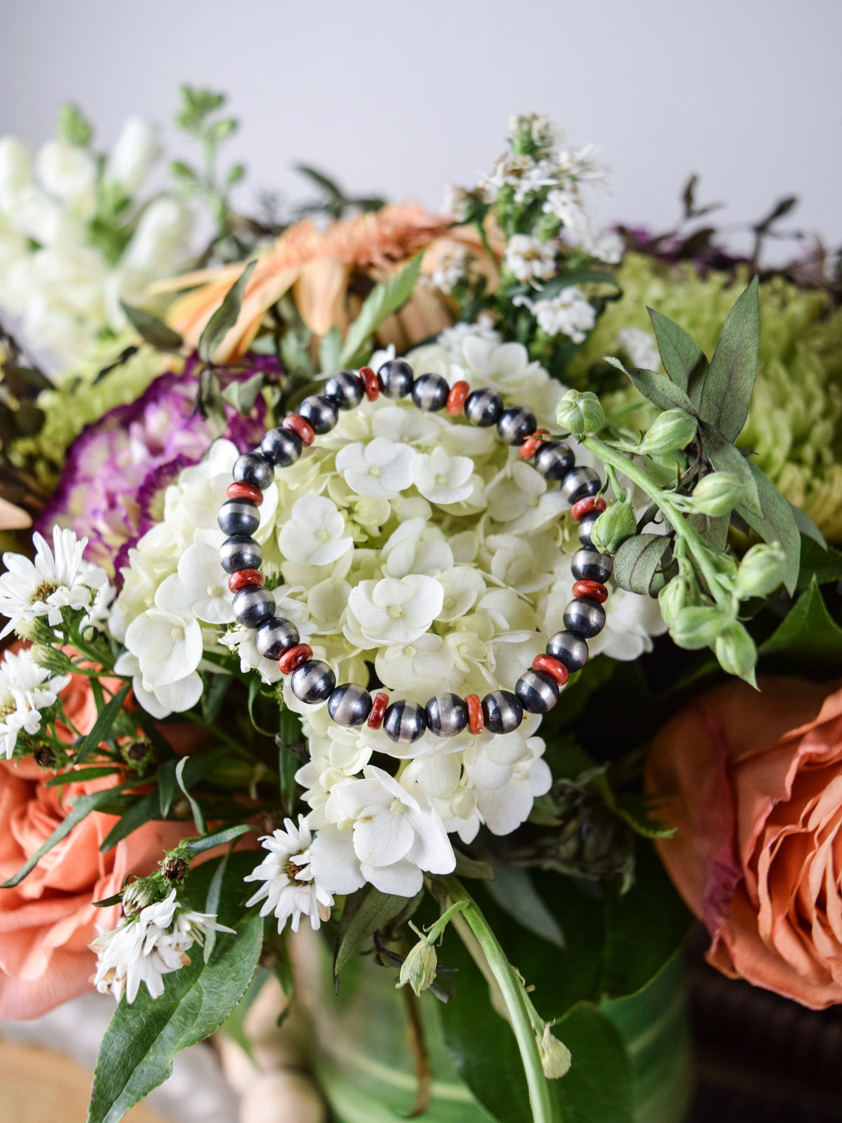The Cam Stretchy Navajo Pearl and Red Coral Bracelet